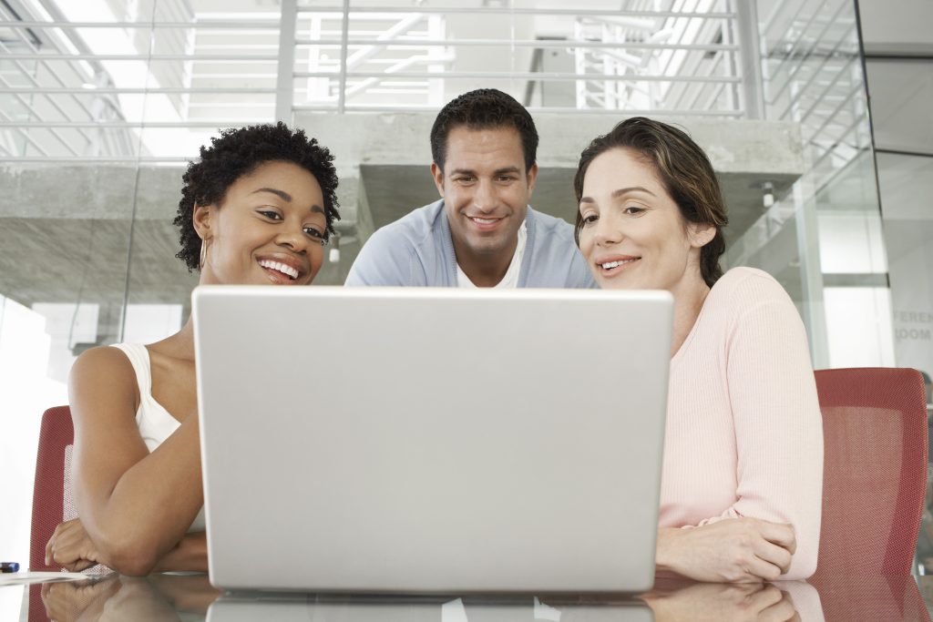 People around a laptop
